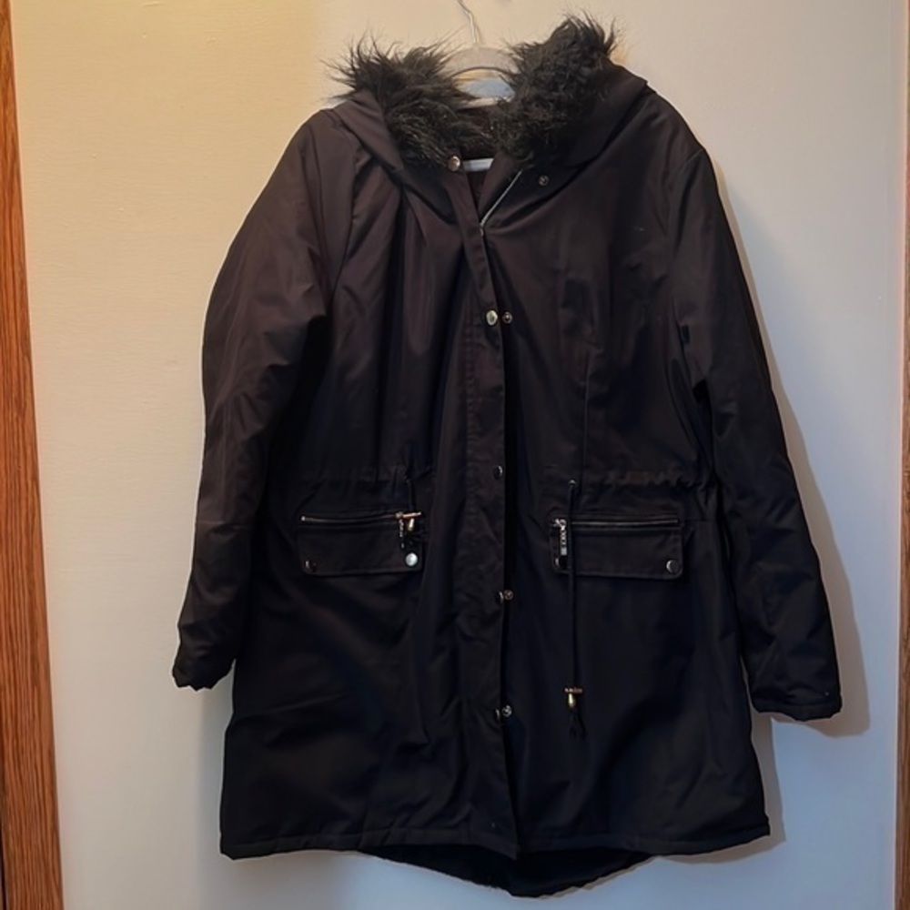 Women’s black winter coat, medium weight has some spots the back good condition